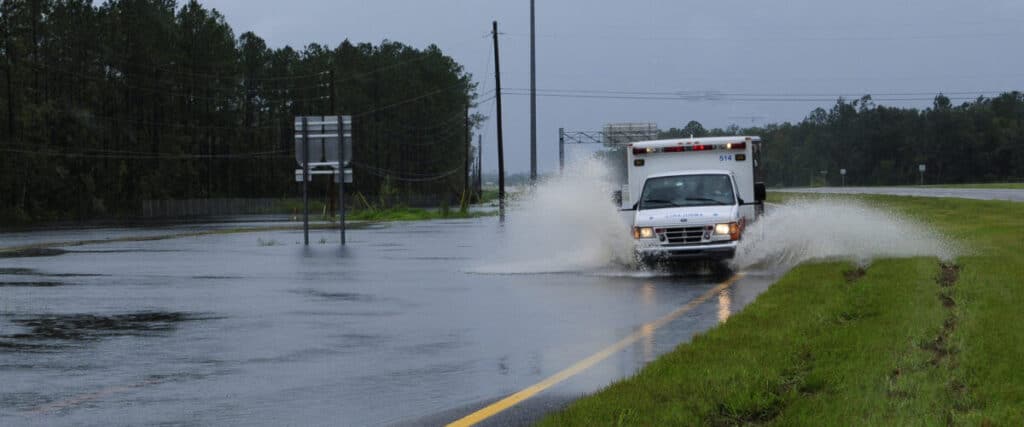 FEMA   37595   Ambulance on a flooded road in Florida 1200x500