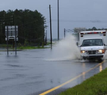 FEMA 37595 Ambulance on a flooded road in Florida 1200x500
