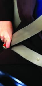 lossless page1 296px Person buckling seatbelt in car.tiff