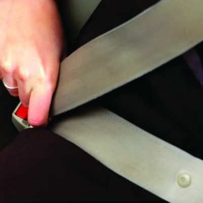 lossless page1 296px Person buckling seatbelt in car.tiff